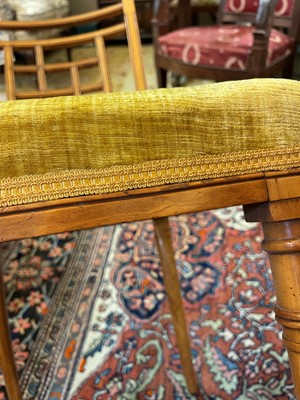 Lot 454 - A set of four Victorian Aesthetic period satinwood side chairs by Howard & Sons