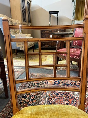 Lot 454 - A set of four Victorian Aesthetic period satinwood side chairs by Howard & Sons