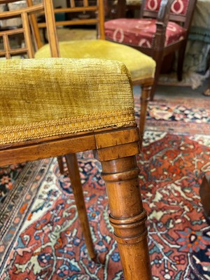 Lot 454 - A set of four Victorian Aesthetic period satinwood side chairs by Howard & Sons