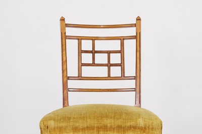 Lot 454 - A set of four Victorian Aesthetic period satinwood side chairs by Howard & Sons