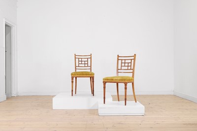 Lot 454 - A set of four Victorian Aesthetic period satinwood side chairs by Howard & Sons
