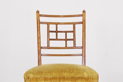 Lot 454 - A set of four Victorian Aesthetic period satinwood side chairs by Howard & Sons