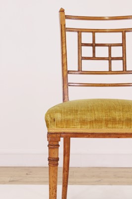 Lot 454 - A set of four Victorian Aesthetic period satinwood side chairs by Howard & Sons