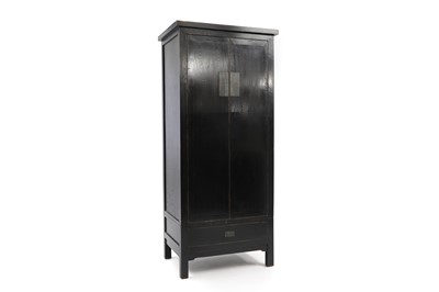 Lot 543 - A Japanese-style black lacquered cupboard