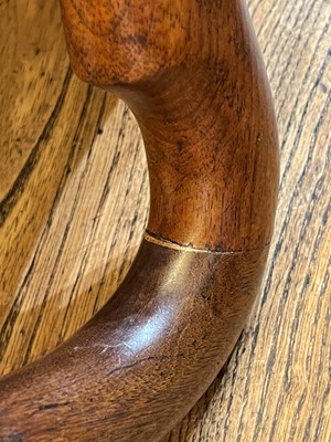 Lot 438 - A George I walnut shepherd's crook armchair