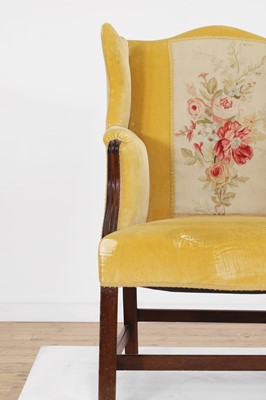 Lot 444 - A George III mahogany wing armchair