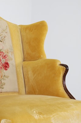 Lot 444 - A George III mahogany wing armchair