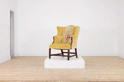 Lot 444 - A George III mahogany wing armchair