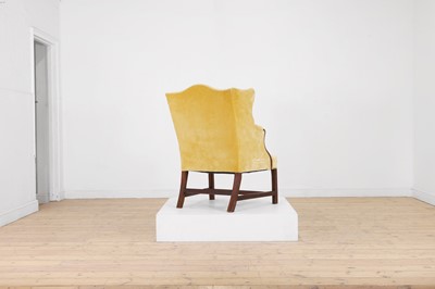 Lot 444 - A George III mahogany wing armchair
