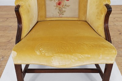Lot 444 - A George III mahogany wing armchair
