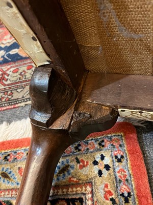 Lot 448 - A George I walnut and beech wing armchair