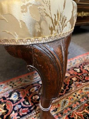 Lot 448 - A George I walnut and beech wing armchair