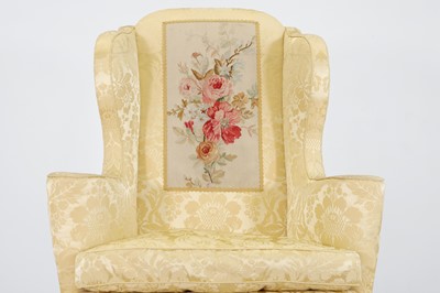 Lot 448 - A George I walnut and beech wing armchair