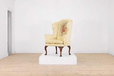 Lot 448 - A George I walnut and beech wing armchair