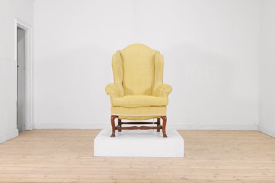 Lot 322 - A beech wing armchair