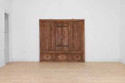 Lot 717 - A carved teak door panel