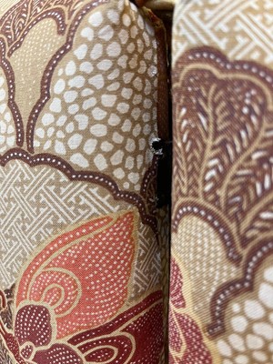 Lot 418 - A three-fold upholstered screen