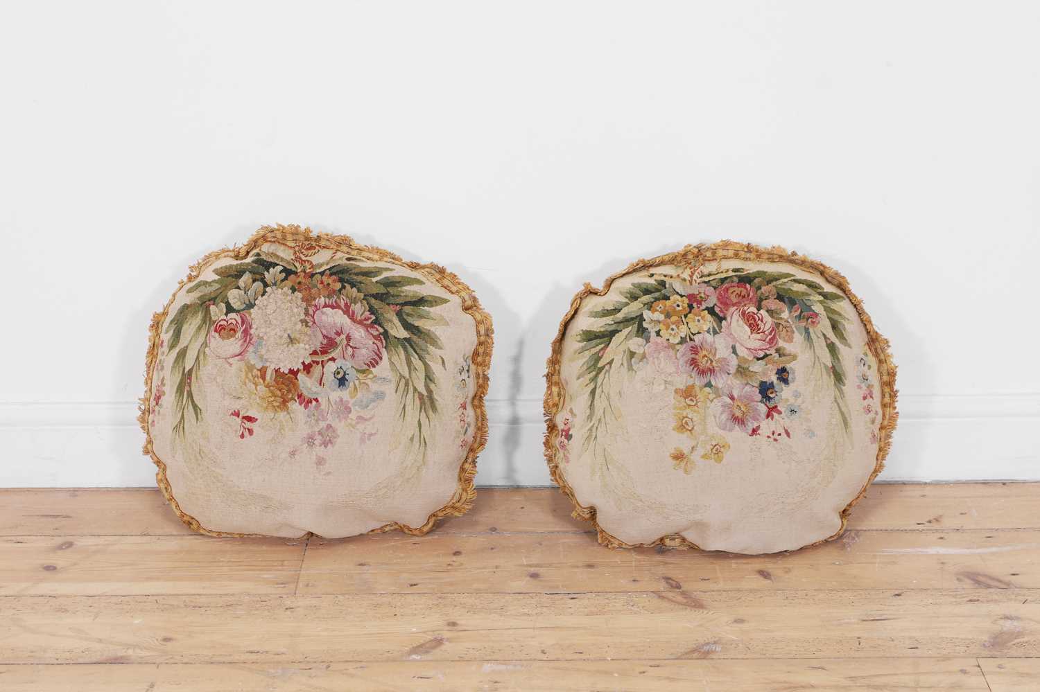Lot 410 - A pair of oval Beauvais wool and silk tapestry cushions
