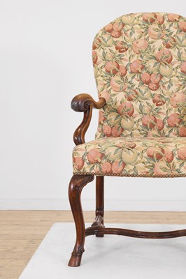 Lot 396 - A walnut open armchair