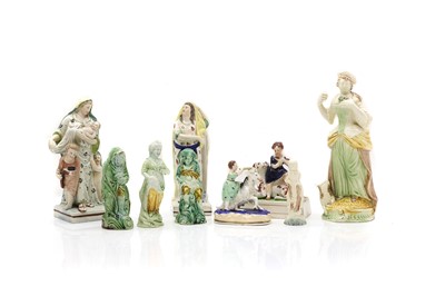 Lot 121 - A collection of Staffordshire pearlware figures