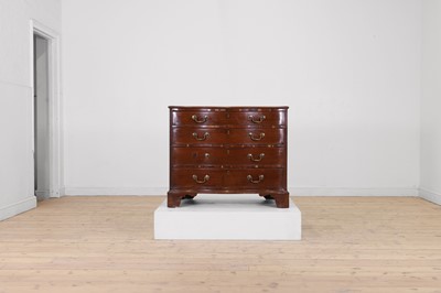 Lot 394 - A George III mahogany serpentine chest