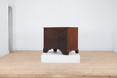 Lot 394 - A George III mahogany serpentine chest