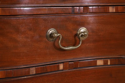 Lot 394 - A George III mahogany serpentine chest