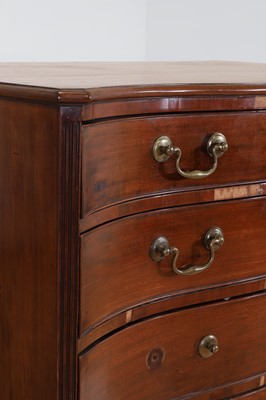 Lot 394 - A George III mahogany serpentine chest