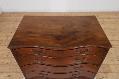 Lot 394 - A George III mahogany serpentine chest