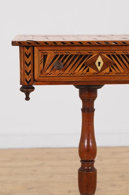 Lot 398 - A Regency rosewood and boxwood games table