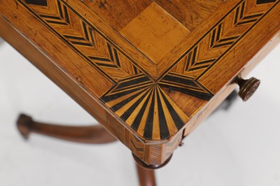 Lot 398 - A Regency rosewood and boxwood games table