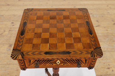 Lot 398 - A Regency rosewood and boxwood games table