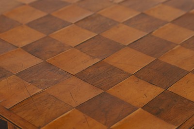 Lot 398 - A Regency rosewood and boxwood games table