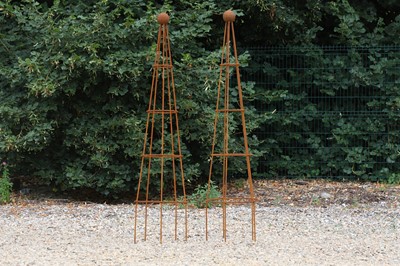 Lot 758 - A pair of metal obelisk planters