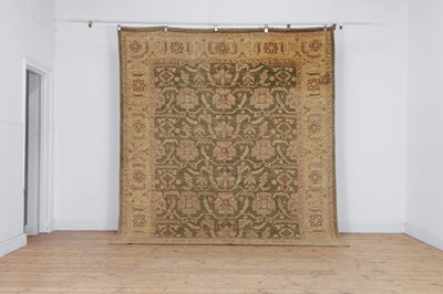 Lot 453 - An Agra design wool rug