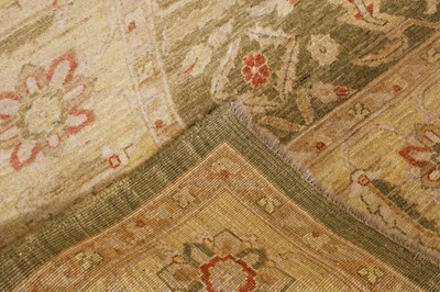 Lot 453 - An Agra design wool rug