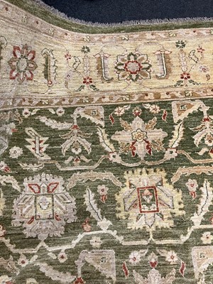 Lot 453 - An Agra design wool rug