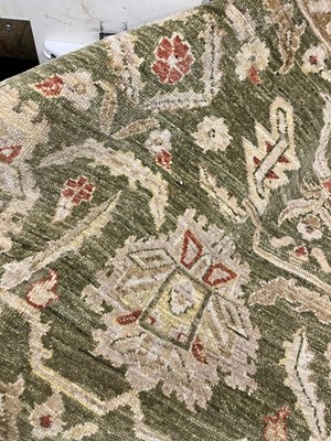 Lot 453 - An Agra design wool rug