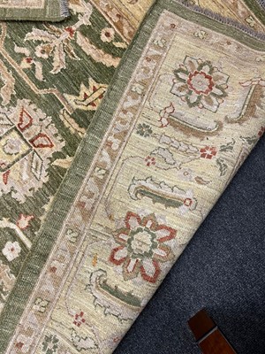 Lot 453 - An Agra design wool rug