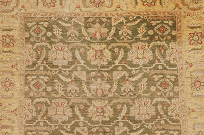 Lot 453 - An Agra design wool rug