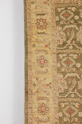 Lot 453 - An Agra design wool rug