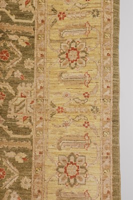 Lot 453 - An Agra design wool rug