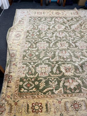 Lot 453 - An Agra design wool rug