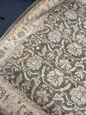 Lot 453 - An Agra design wool rug