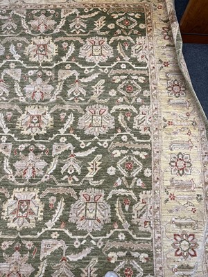 Lot 453 - An Agra design wool rug