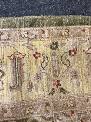 Lot 453 - An Agra design wool rug