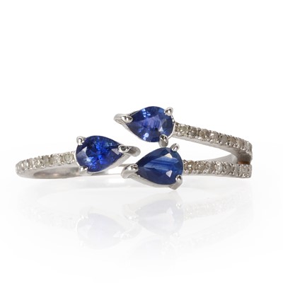 Lot 161 - A silver sapphire and diamond open trident style ring