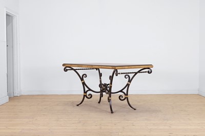 Lot 618 - A lacquered wooden brass and iron centre table