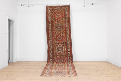 Lot 383 - A Persian Heriz wool runner