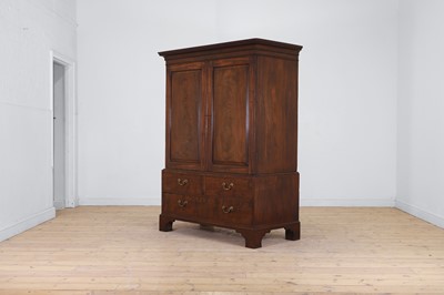 Lot 634 - A small George III mahogany linen press